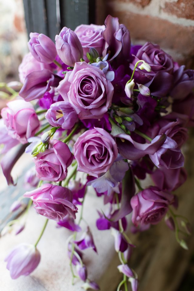 Purple cascading bridal bouquet